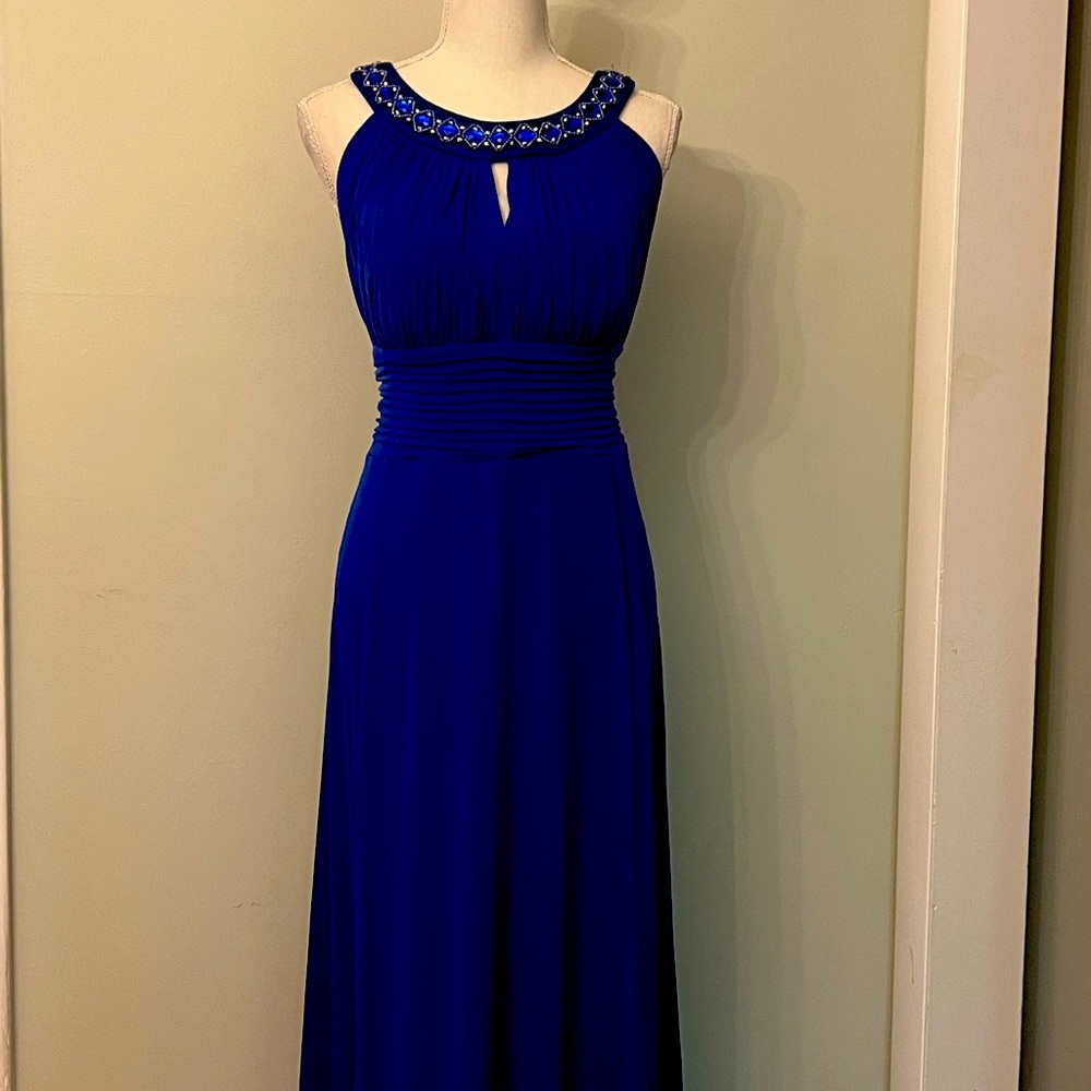 Fabulous brilliant blue beaded halter style gown with side zip and built in bra!